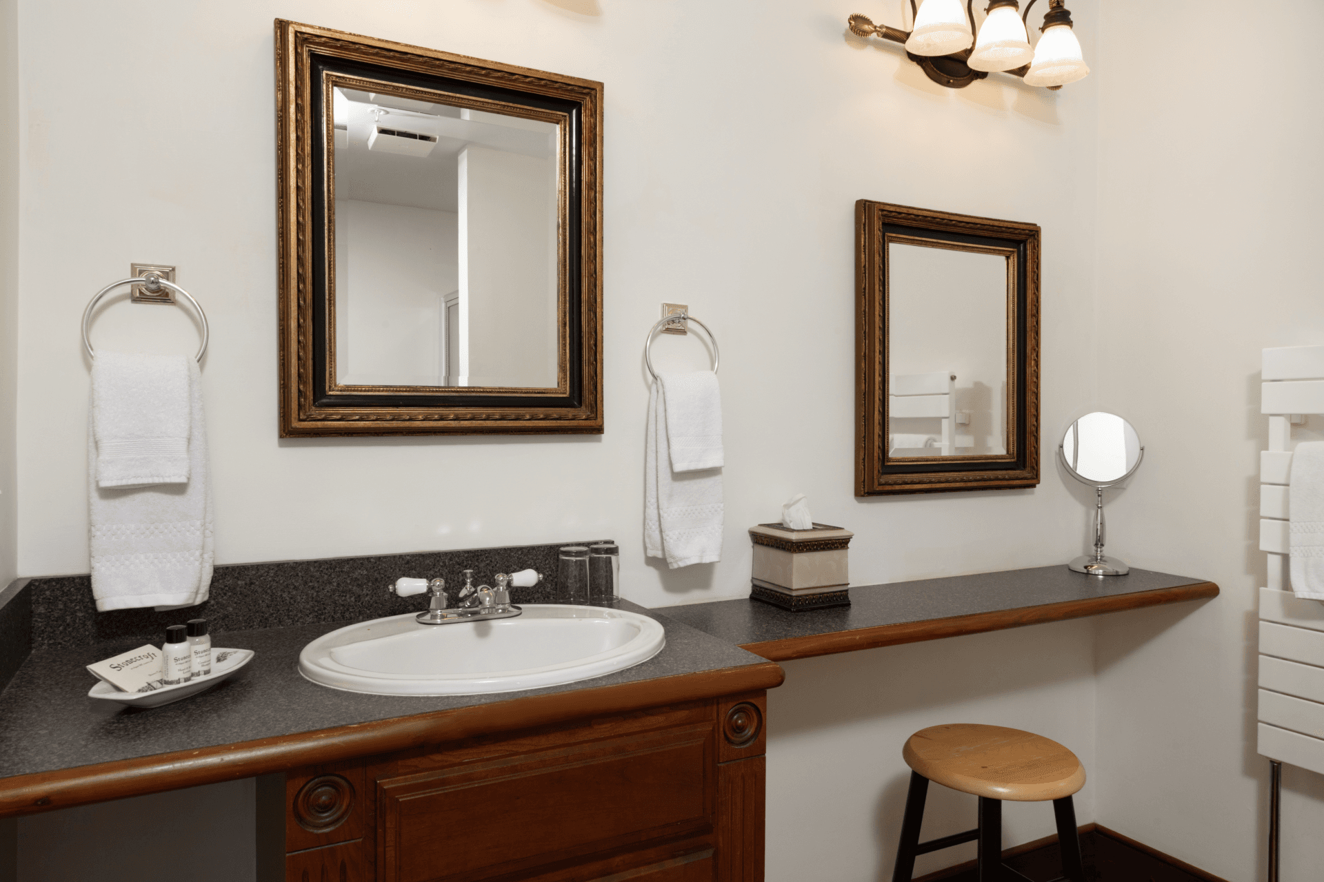 a large shower and view of the rest of the room