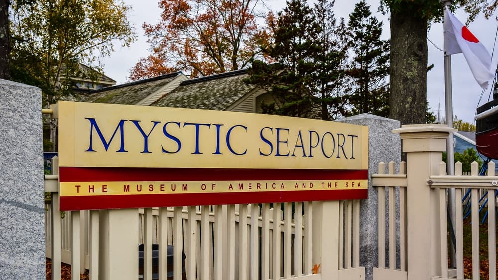 Sign for Mystic Seaport, "The Museum of America and the Sea."
