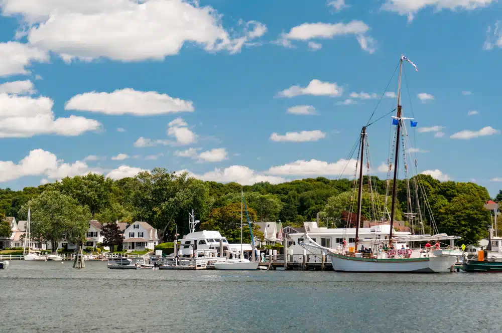 Argia Mystic Cruises, photo of the Mystic Seaport Museum, seen from a sailboat